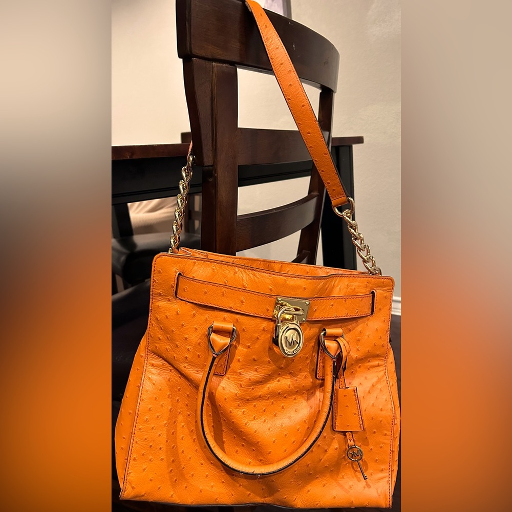 Michael Kors Ostrich orange big shoulder bag.